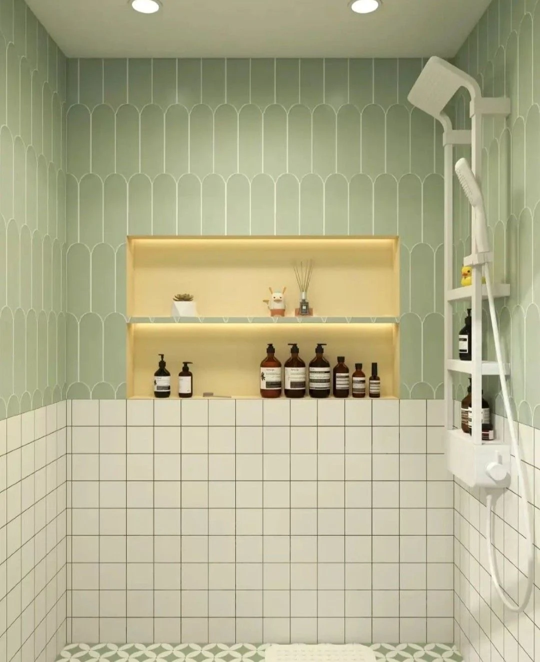 Terracotta vertical tile shower with brass fixtures in Northfield home